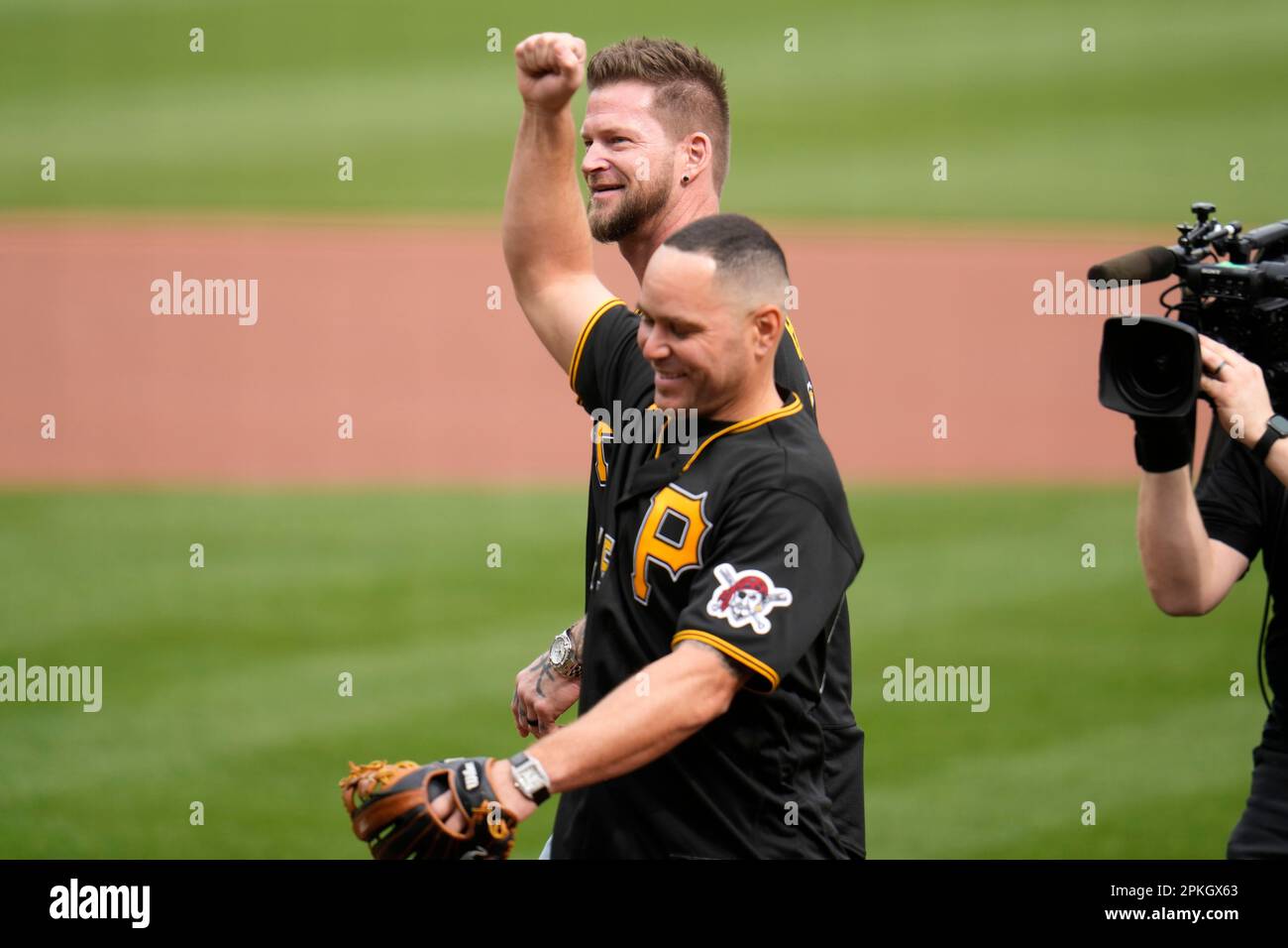 Former Pittsburgh Pirates catcher Russell Martin, front center, and