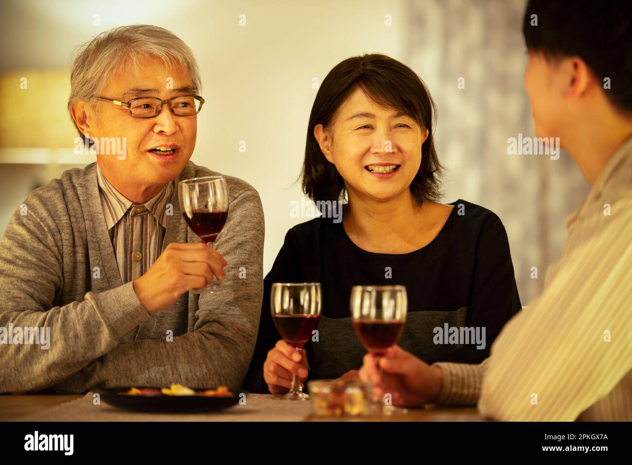 Parent and child drinking wine Stock Photo Alamy