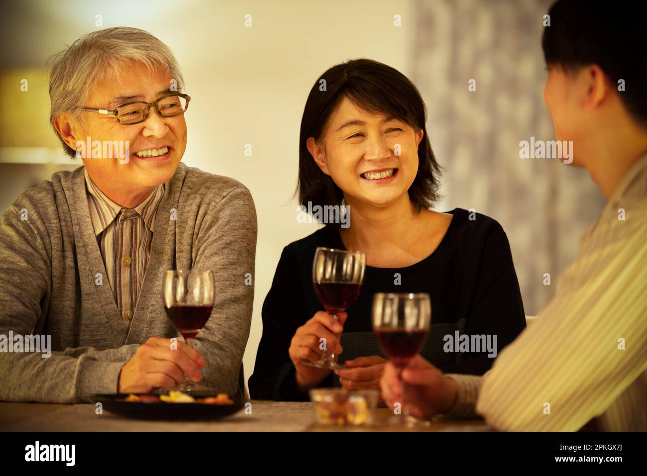 Parent and child drinking wine Stock Photo Alamy