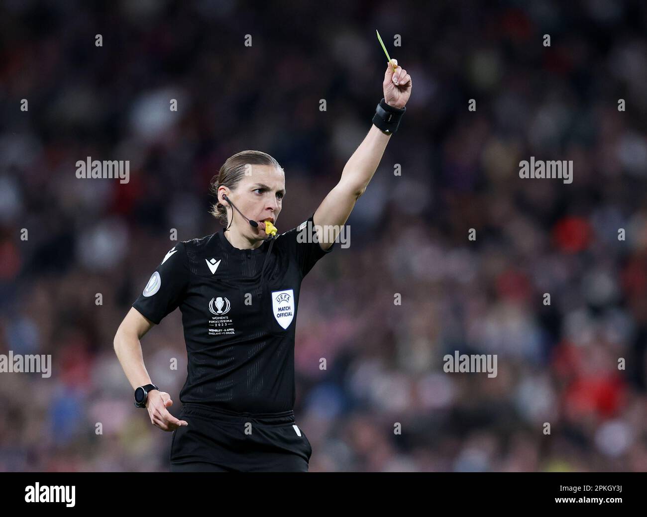 London, UK. 6th Apr, 2023. Stéphanie Frappart shows a yellow card during the Women's CONMEBOL/UEFA Finalissima match at Wembley Stadium, London. Picture credit should read: Paul Terry/Sportimage Credit: Sportimage/Alamy Live News Stock Photo