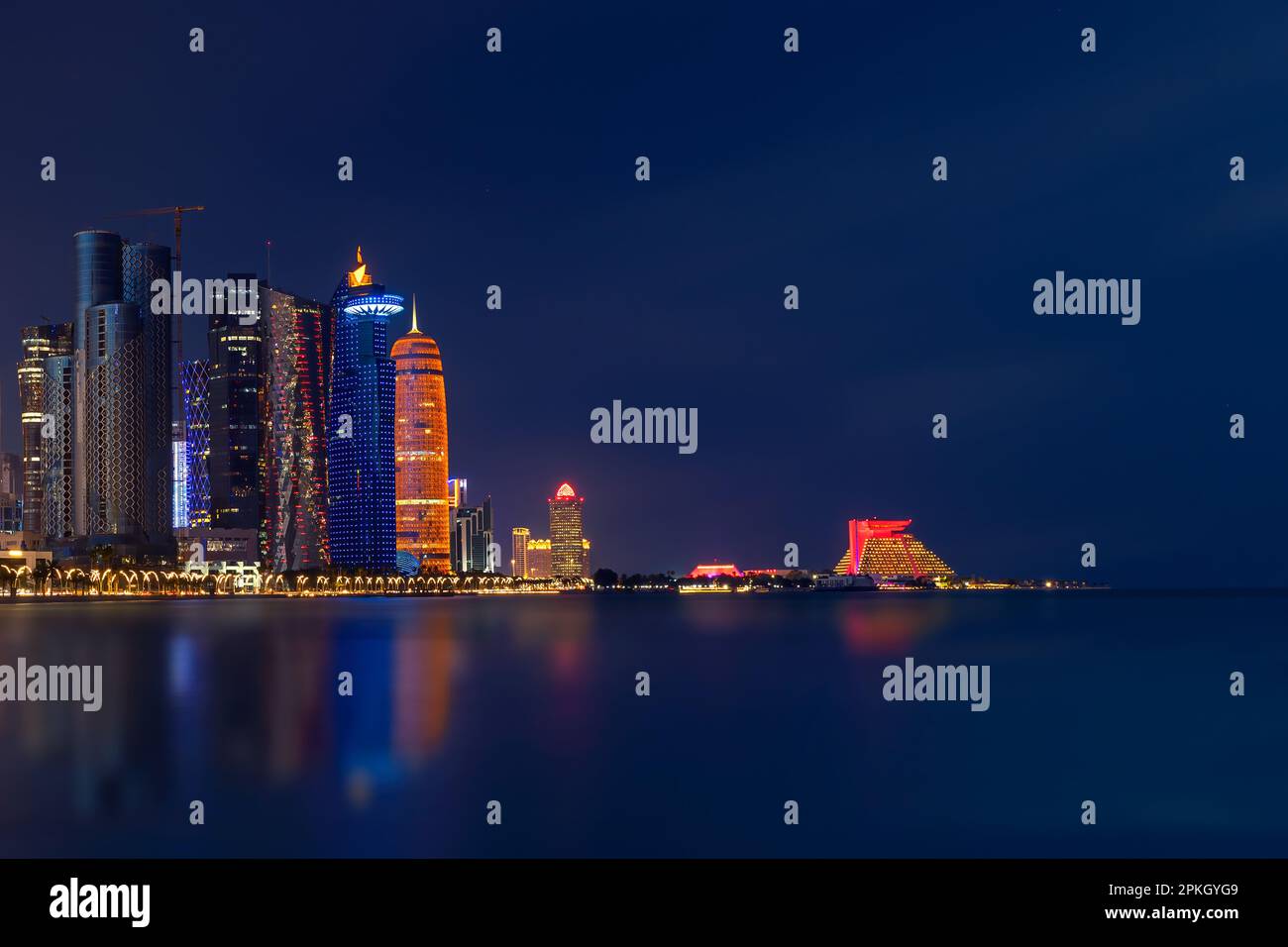 Illuminated Beautiful Doha Skyline after sunset Stock Photo - Alamy