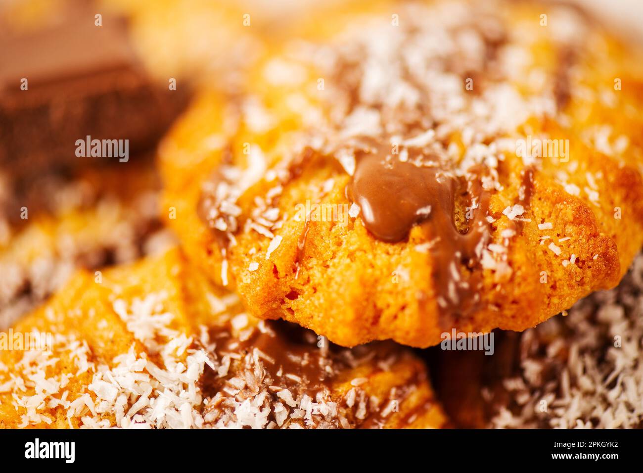 Fresh-baked Snickerdoodle cookies with chocolate and shredded coconut. Stock Photo