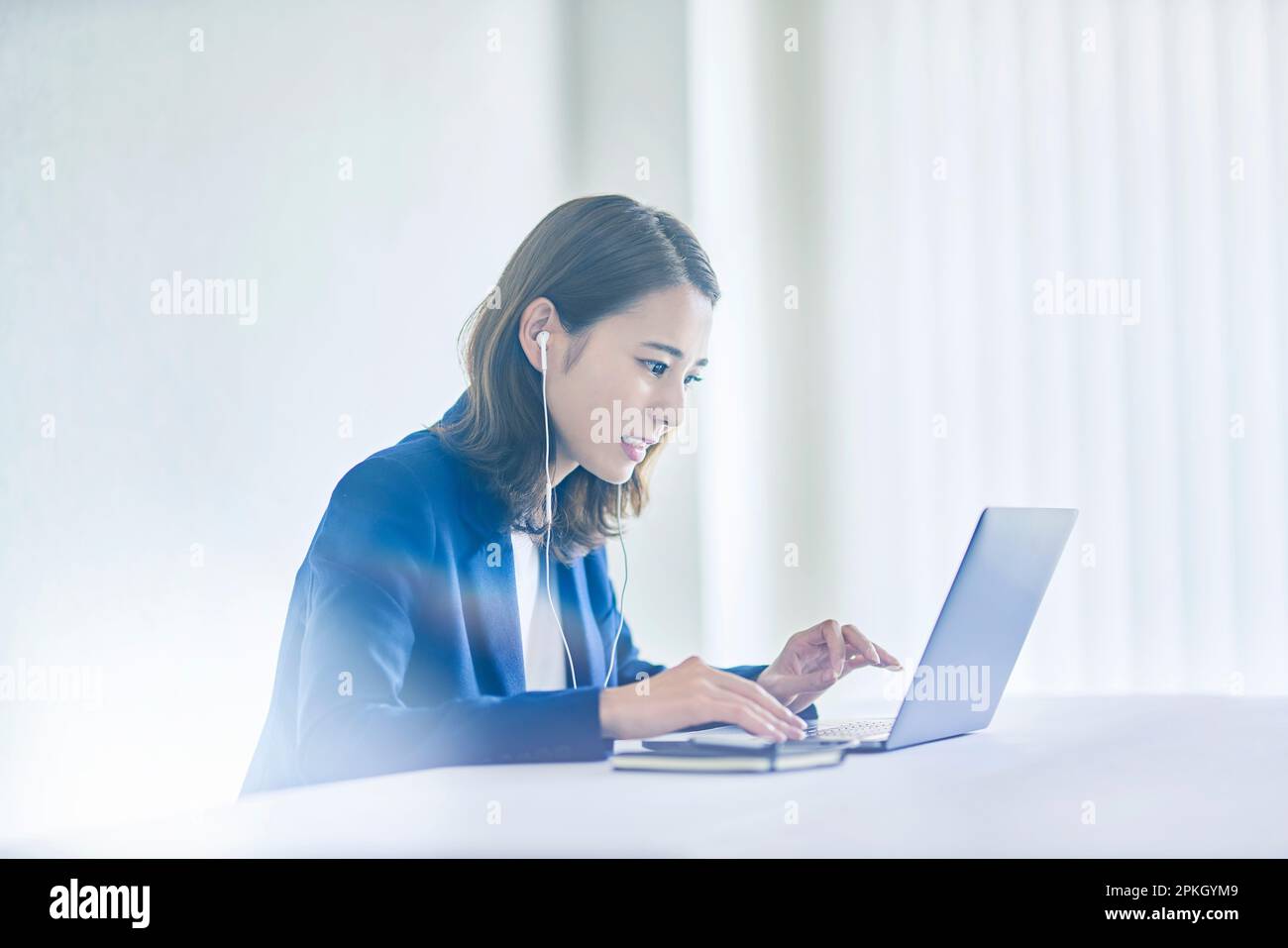 Woman having an online meeting with a smile Stock Photo