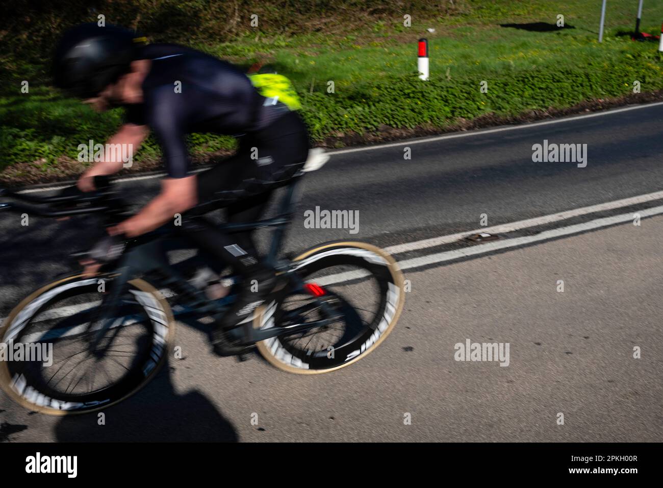 Time trailer, Blurred bike racer passing by Stock Photo