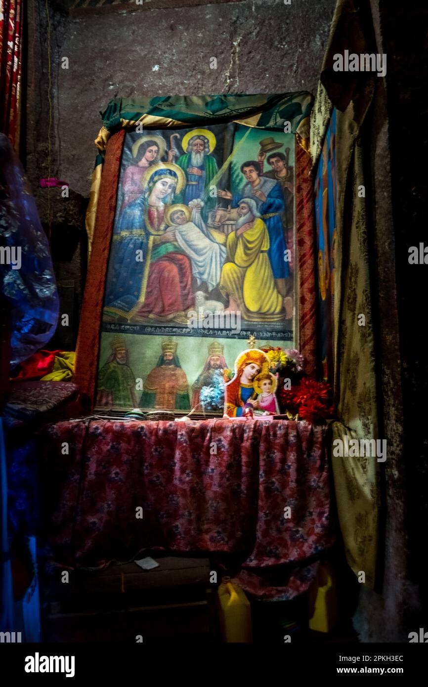 Shrine with depiction of baby Jesus and the adoring Magi in the temple inside Lalibela during the Ethiopian Christian Orthodox Easter celebration of F Stock Photo