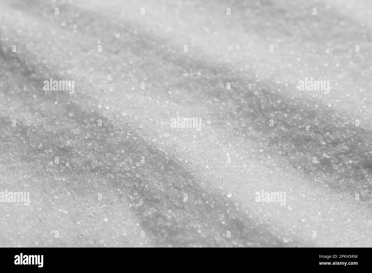 Sweet granulated sugar as background, closeup view Stock Photo