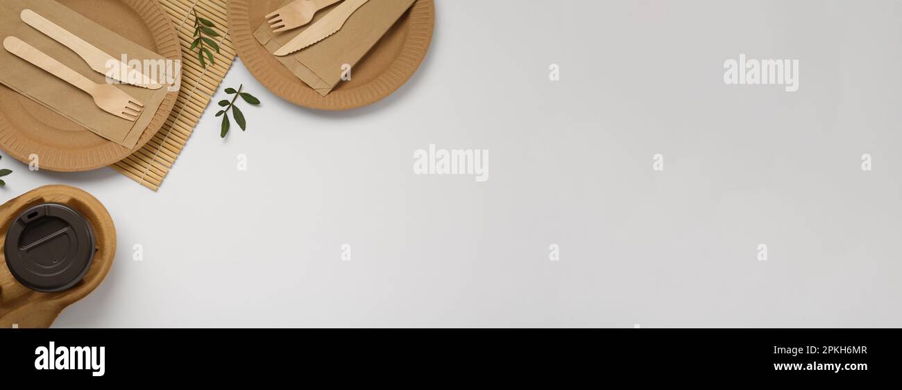 Eco friendly products on light background, flat lay with space for text ...