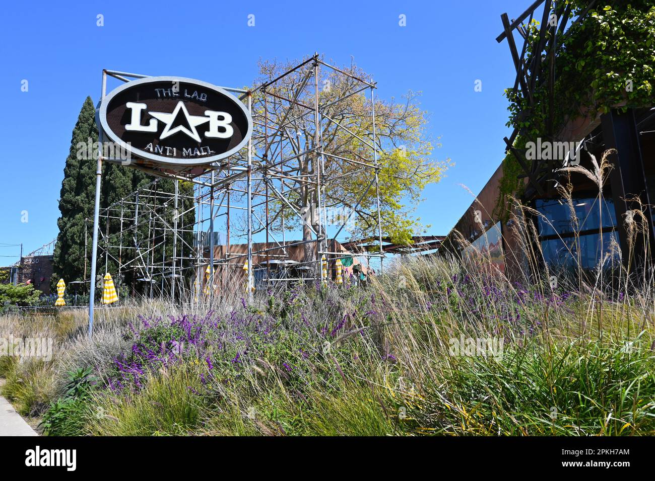 COSTA MESA, CALIFORNIA - 4 APR 2023: The LAB Anti Mall, a modern, open air destination featuring trendy retail shops, a range of restaurants and art g Stock Photo