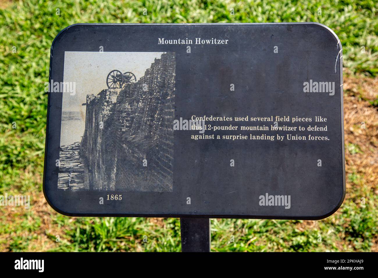 This sign at the Fort Sumter National Monument in Charleston, SC describes the Mountain Howitzer and its use by the Confederacy during the Civil War. Stock Photo