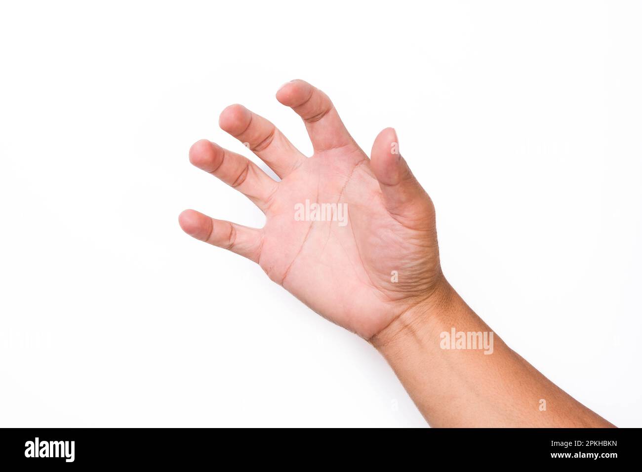 Close up of male hand reaching out ready to help or receive isolated on pink background. Helping hand outstretched for salvation. Stock Photo