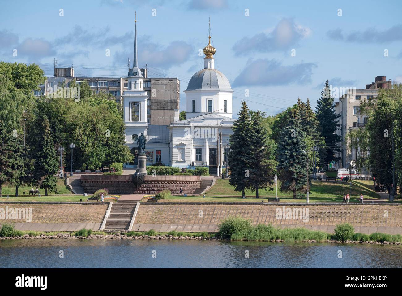TVER, RUSSIA - JULY 15, 2022: View of the monument to the Russian traveler Afanasy Nikitin and the Church of the Resurrection of Christ on a July afte Stock Photo