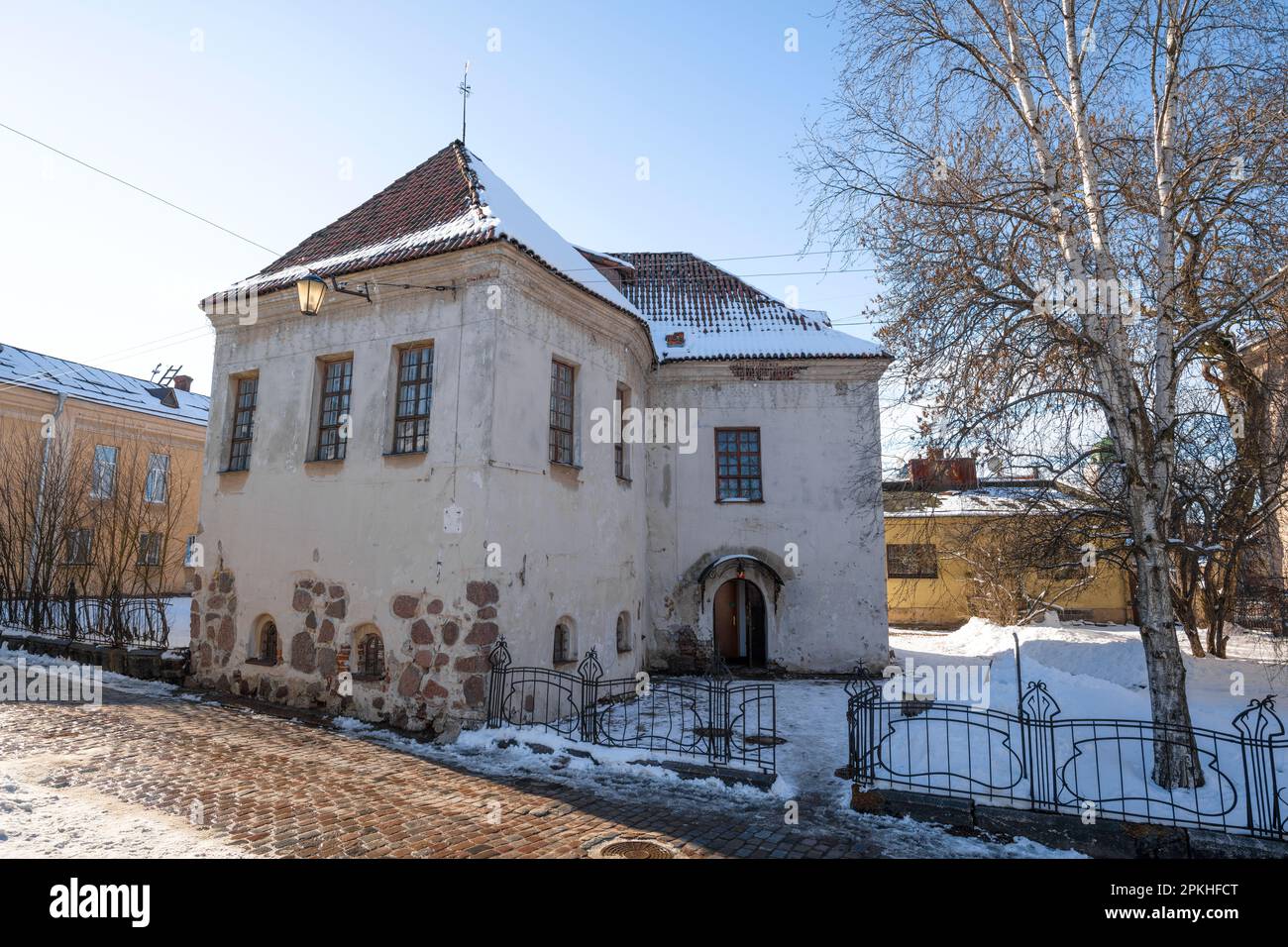 Knight's House (House of Janish, Church of St. Hyacinth) - one of the oldest medieval buildings in Vyborg on a March day. Leningrad region, Russia Stock Photo