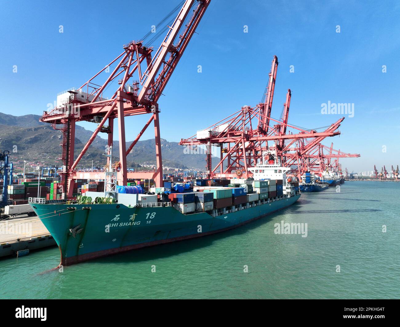 LIANYUNGANG, CHINA - APRIL 8, 2023 - Cargo is loaded and unloaded at a ...