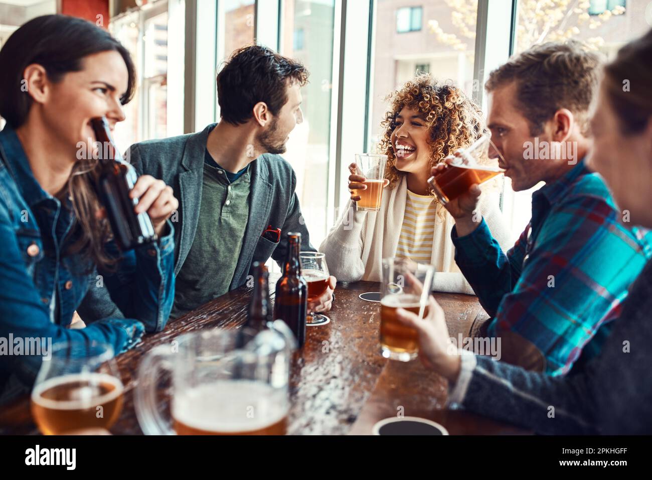 friendship brought us together, beer keeps us together. young people