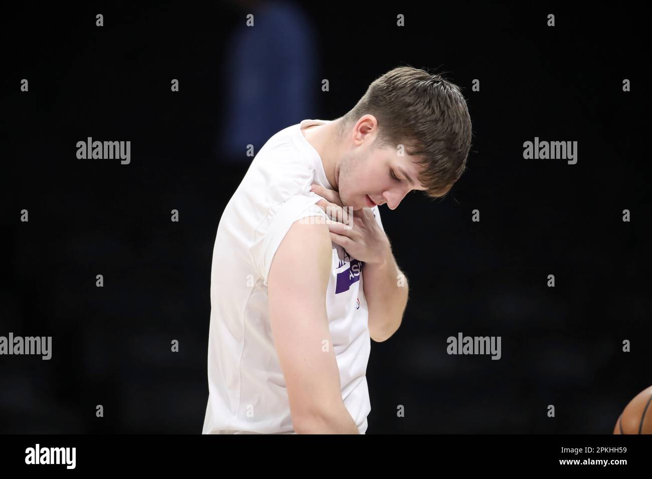 LOS ANGELES, CA - APRIL 07:Los Angeles Lakers guard Austin Reaves (15)  looks at his bruised arm before the Phoenix Suns vs Los Angeles Lakers game  on April 07, 2023, at Crypto.com