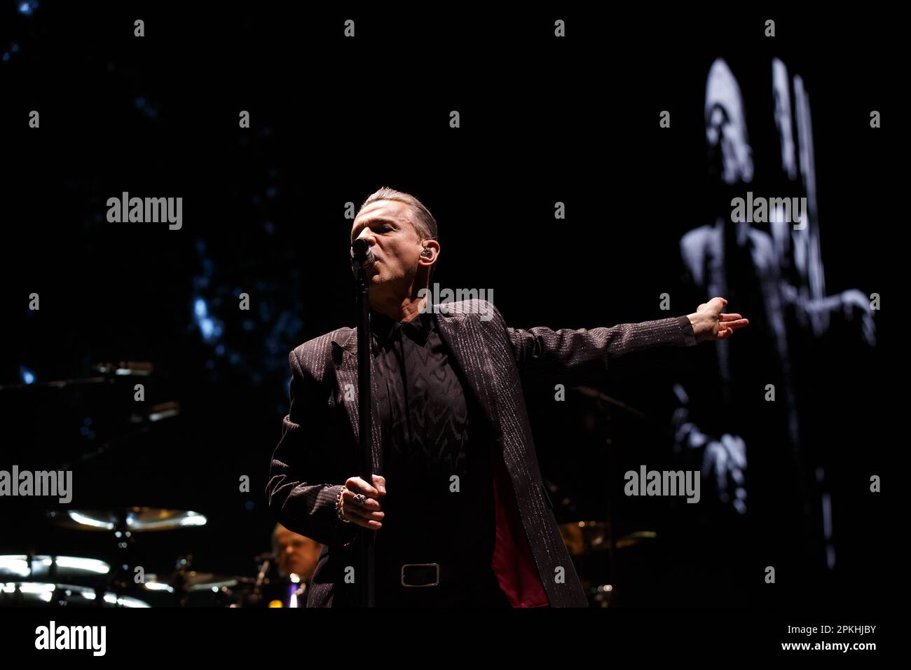 Depeche Mode lead singer Dave Gahan performing on stage during the