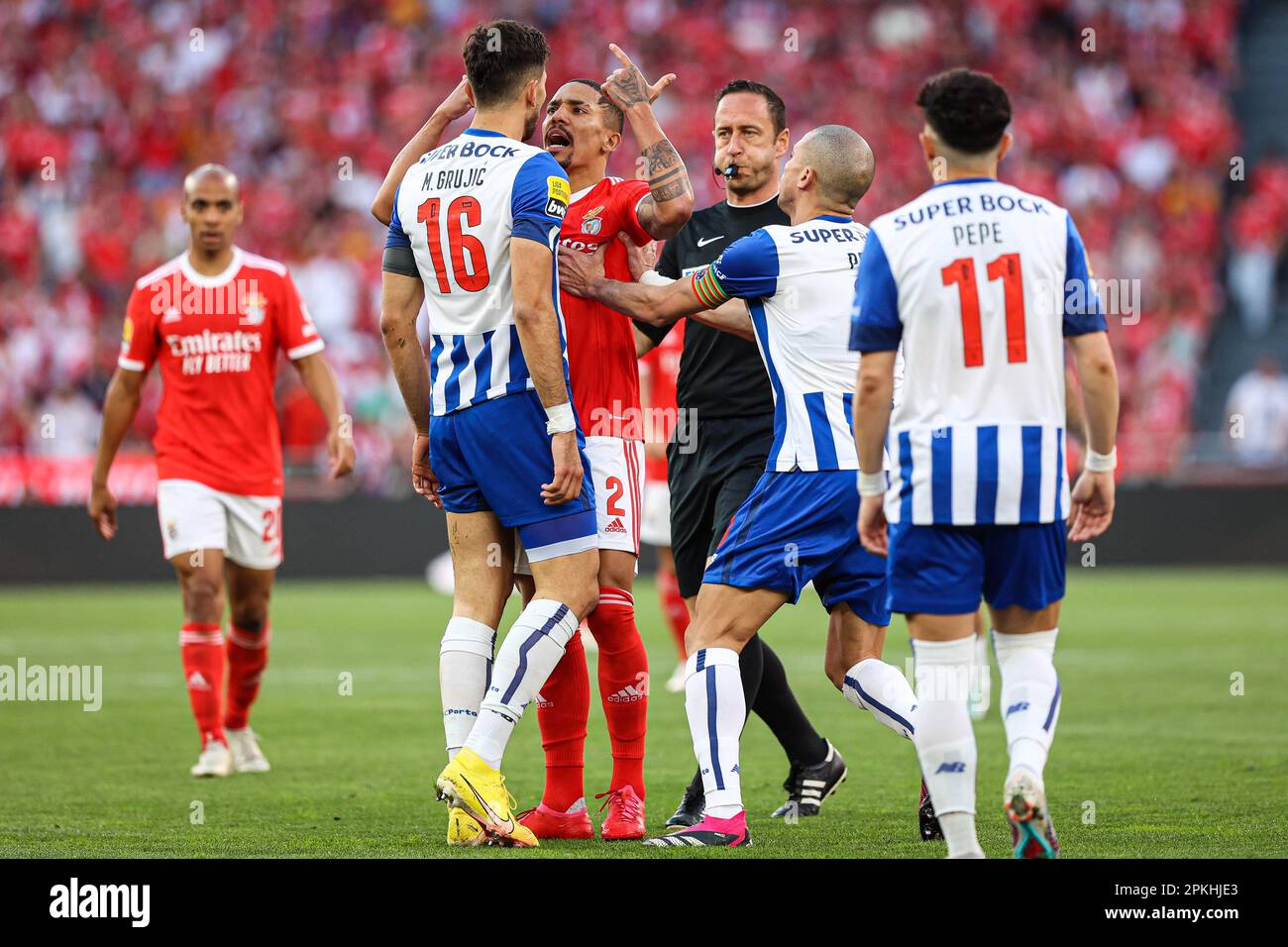 Lisboa, Portugal. 07th Apr, 2023. Gilberto Moraes Júnior of SL Benfica (No.2) argues with Marko Grujic of FC Porto (No.16) in action during the Liga Portugal Bwin match between SL Benfica and FC Porto at Estadio da Luz in Lisbon.(Final score: SL Benfica 1 - 2 FC Porto) Credit: SOPA Images Limited/Alamy Live News Stock Photo