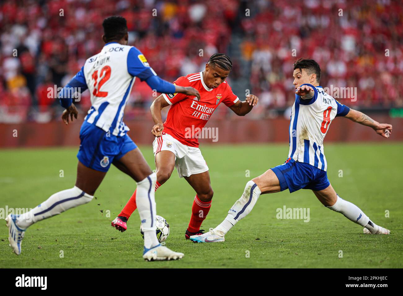 Lisboa, Portugal. 07th Apr, 2023. David Neres of SL Benfica (C) and Mateus Uribe of FC Porto (R) in action during the Liga Portugal Bwin match between SL Benfica and FC Porto at Estadio da Luz in Lisbon.(Final score: SL Benfica 1 - 2 FC Porto) Credit: SOPA Images Limited/Alamy Live News Stock Photo