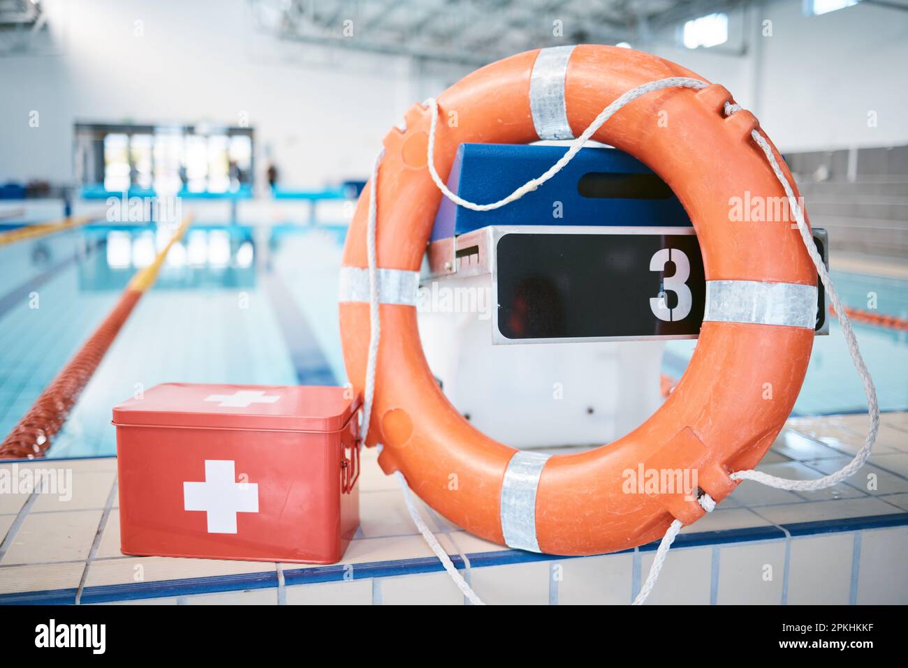 Swimming, equipment and first aid at a pool for security, safety and