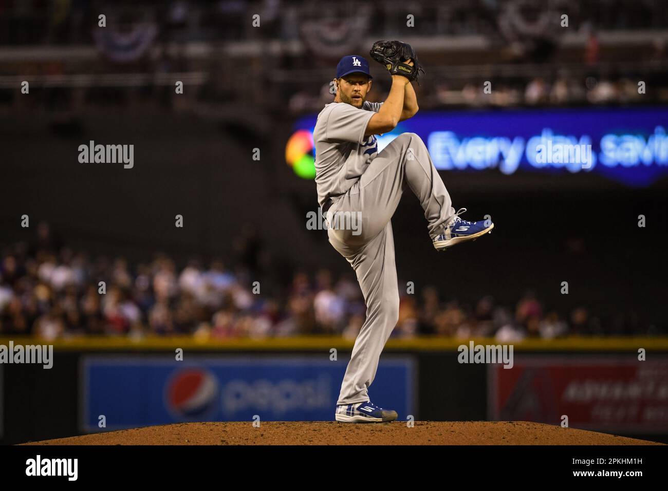 Los Angeles Dodgers pitcher Clayton Kershaw (22) pitches against the Arizona Diamondbacks in the first inning of an MLB baseball game at Chase Field, Stock Photo