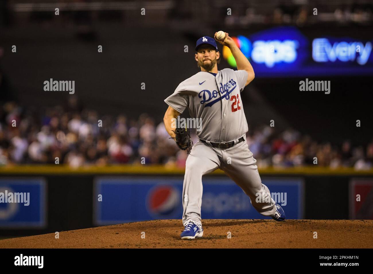 Los Angeles Dodgers pitcher Clayton Kershaw (22) pitches against the Arizona Diamondbacks in the first inning of an MLB baseball game at Chase Field, Stock Photo