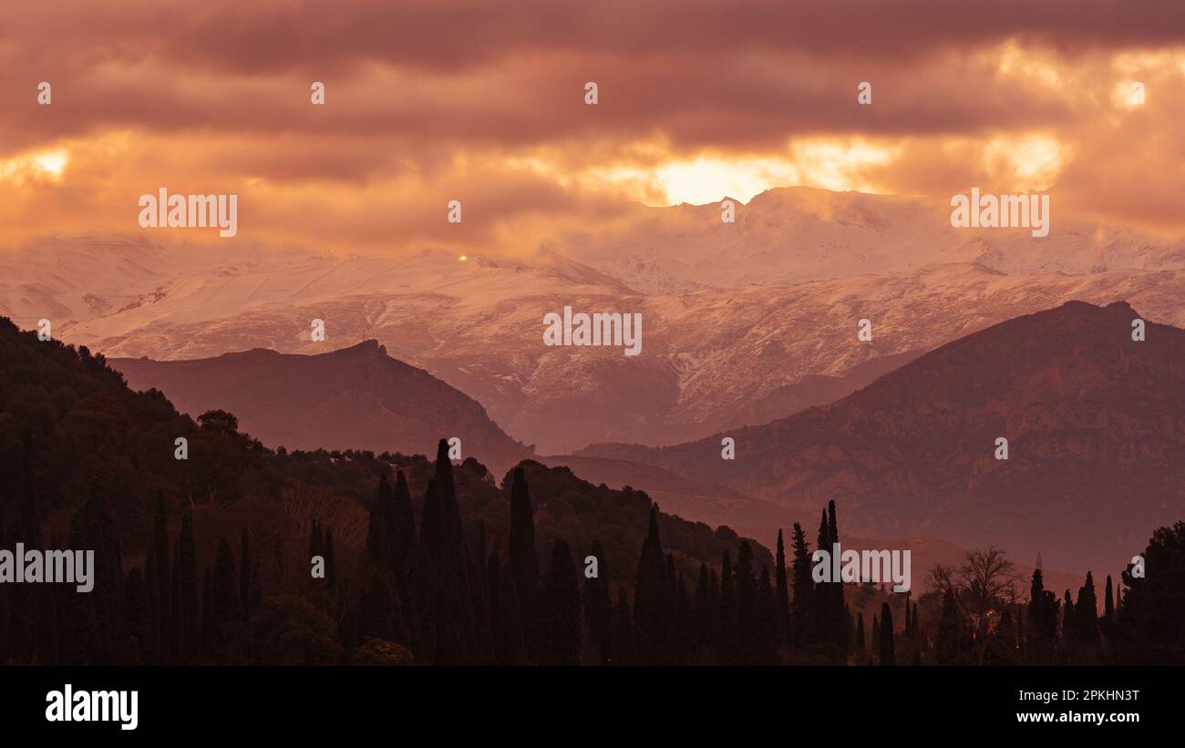 Sunrise over the mountains of the Sierra Nevada in Spain. Photo from Granada. Stock Photo