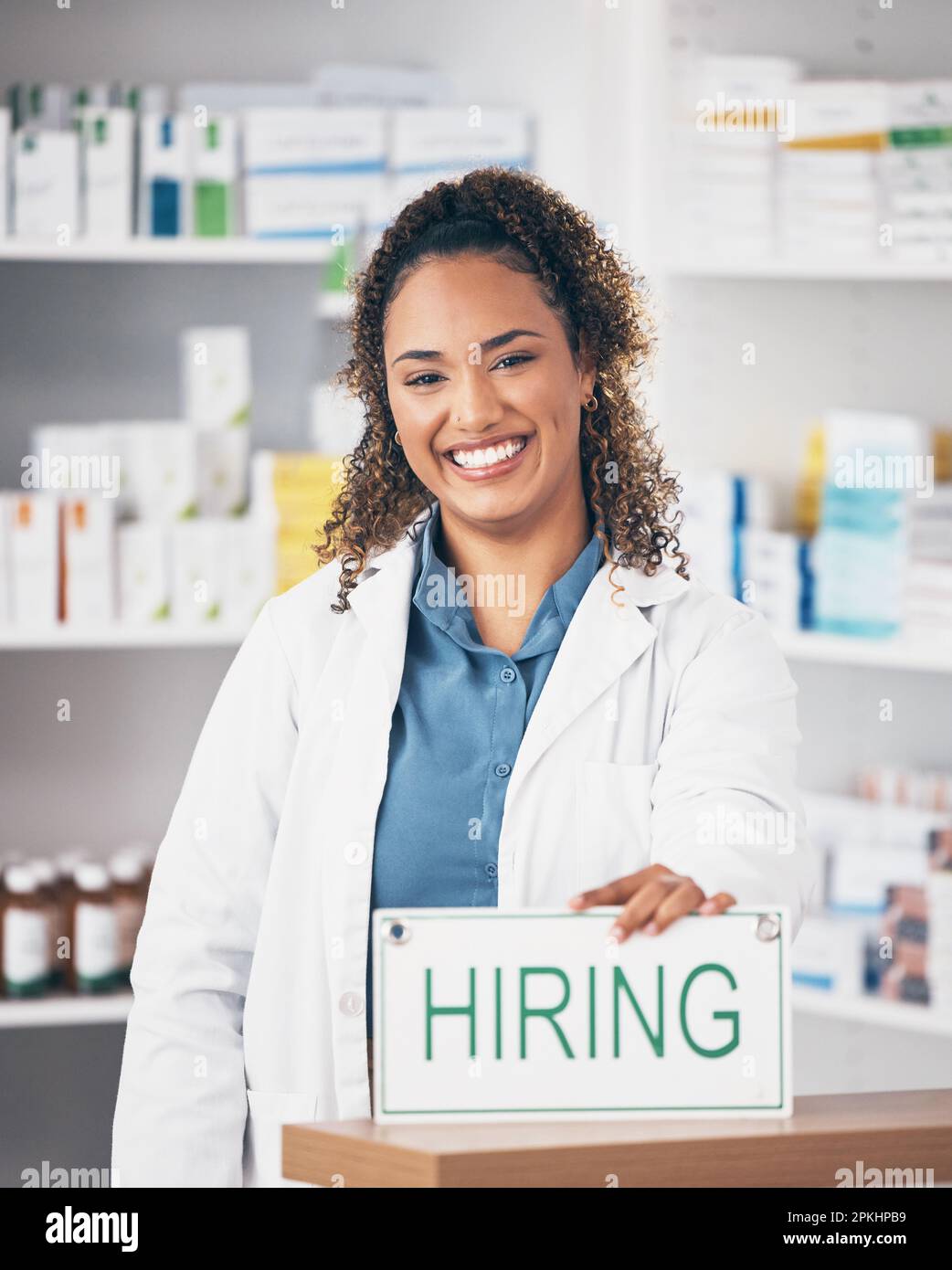 Pharmacy woman, smile and poster in portrait for hiring, job and