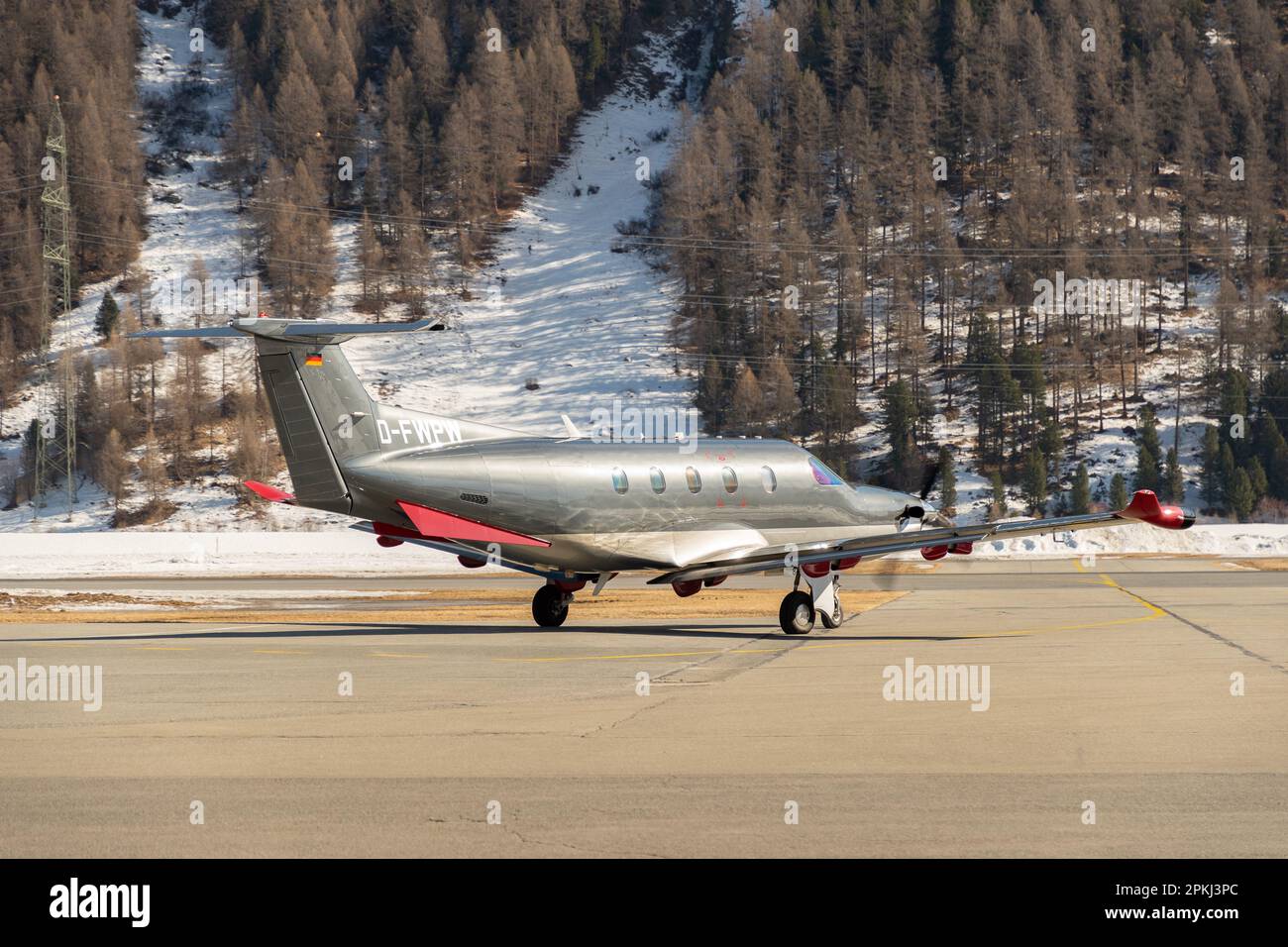 Samedan, Switzerland, February 21, 2023 Pilatus PC-12-47 propeller plane on the apron Stock Photo