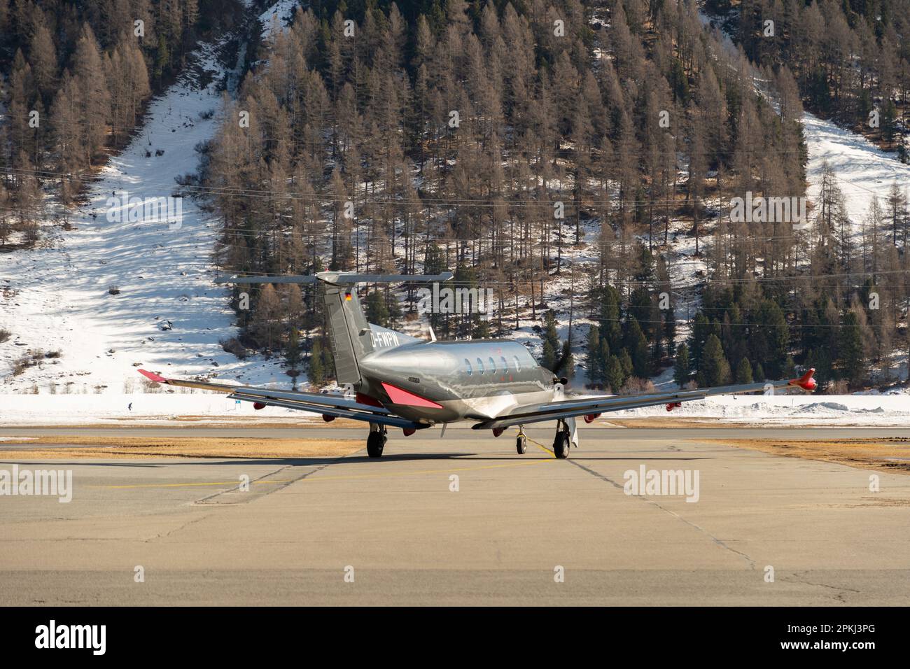 Samedan, Switzerland, February 21, 2023 Pilatus PC-12-47 propeller plane on the apron Stock Photo