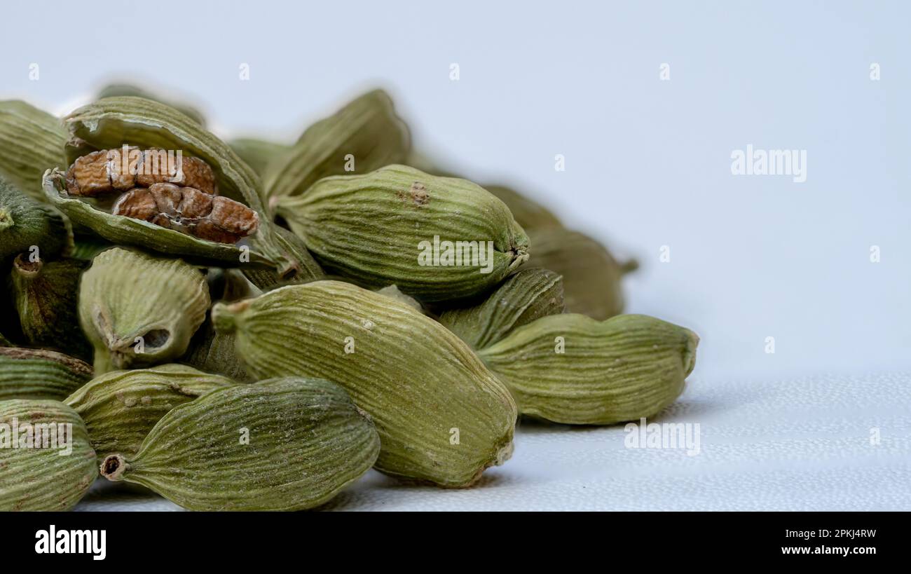 Exquisite Flavor: Cardamom Pile in Light Green Tones on Fresh and Dry Surface Stock Photo