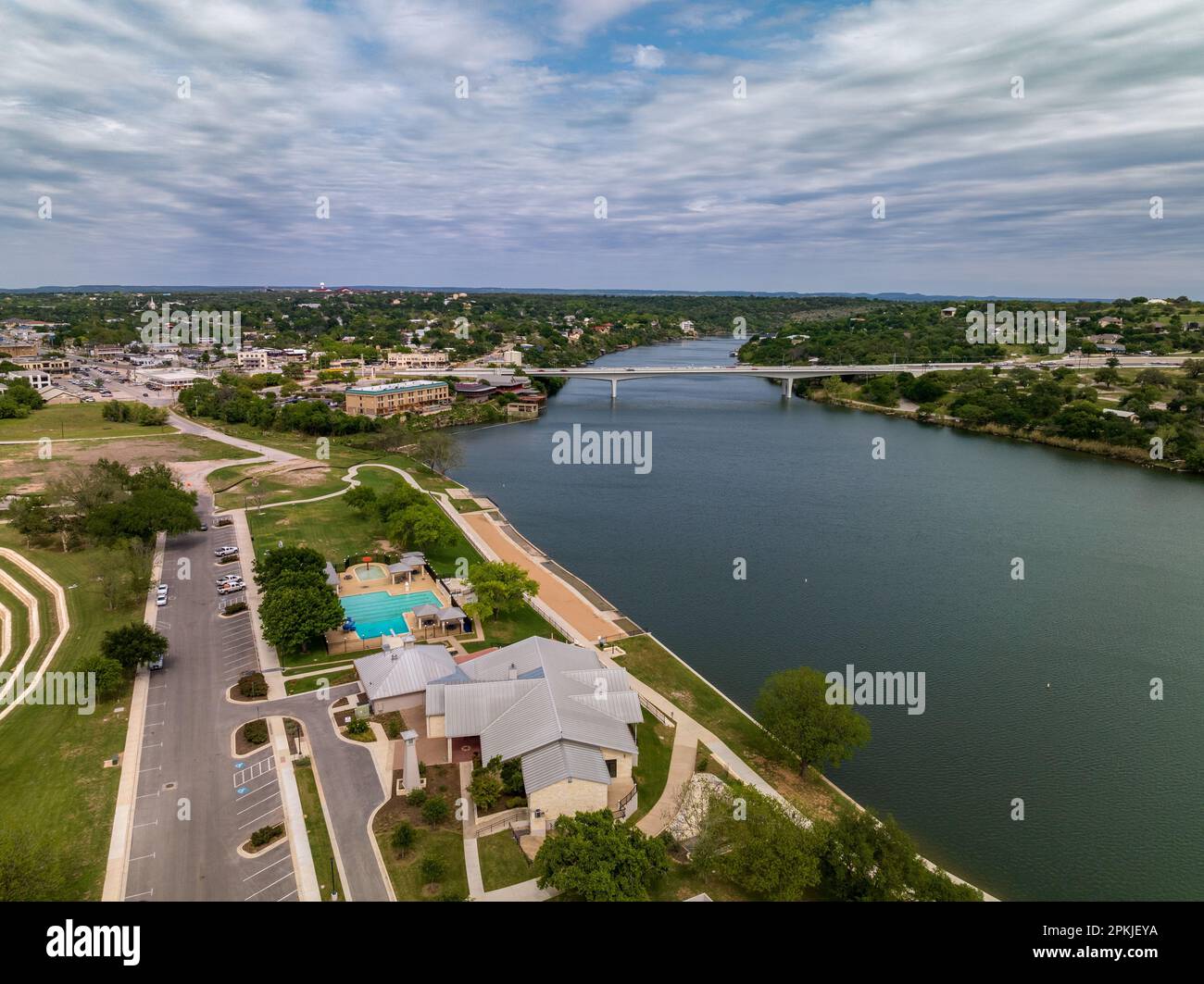 An aerial view of bustling cityscape, Marble Falls Bridge, Lake Marble