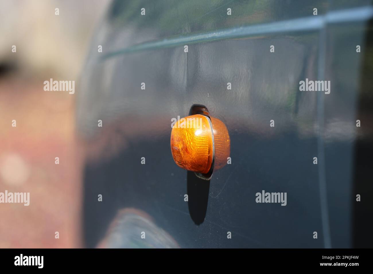 Turn signal lights or side indicator of an old car Stock Photo