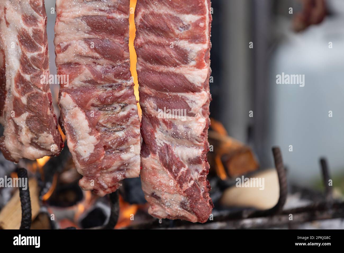 tasty rack of pork ribs cooking on barbecue Stock Photo Alamy