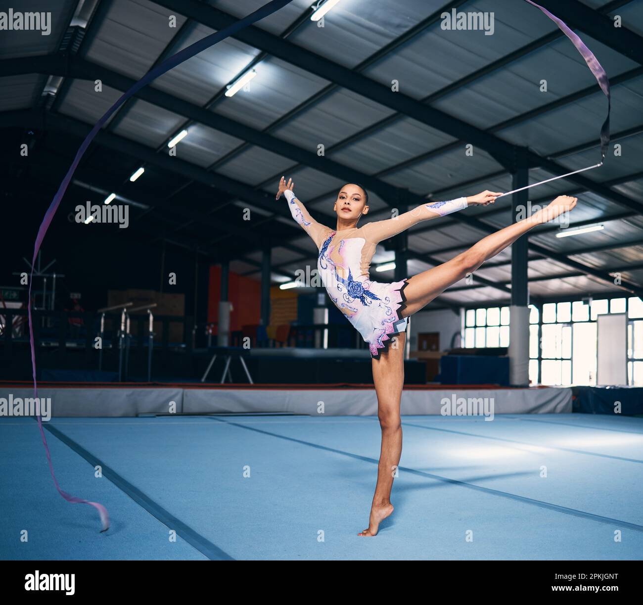 Ribbon, gymnastics and portrait of woman balance in performance, dance training and sports