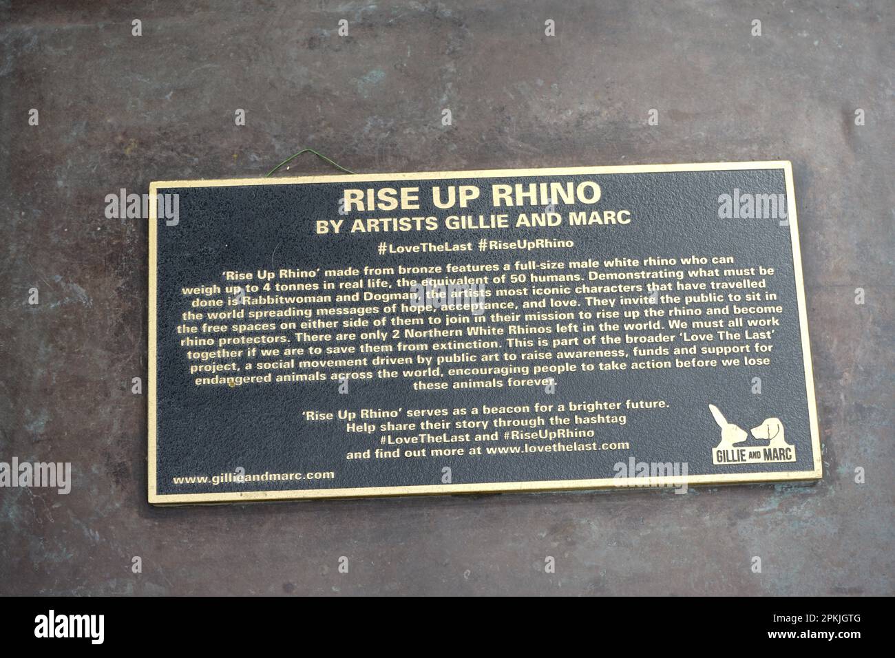 An information board for “Rise Up Rhino,” a bronze sculpture by artists Gillie & Marc at Westfield Shopping Centre in White City, west London. Stock Photo