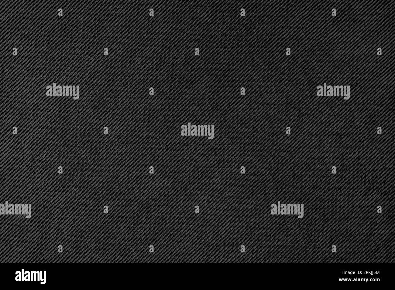 Texture background of velours black fabric. Upholstery velveteen