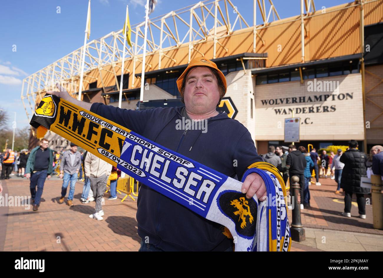 A scarf seller before the Premier League match at Molineux Stadium, Wolverhampton. Picture date: Saturday April 8, 2023. Stock Photo