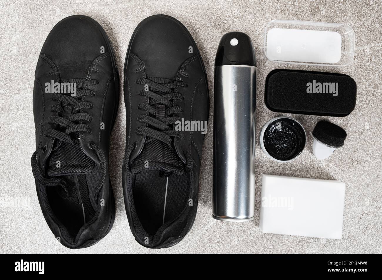 Set for cleaning black shoes from nubuck - water-repellent spray, cream  paint, sponges Stock Photo - Alamy