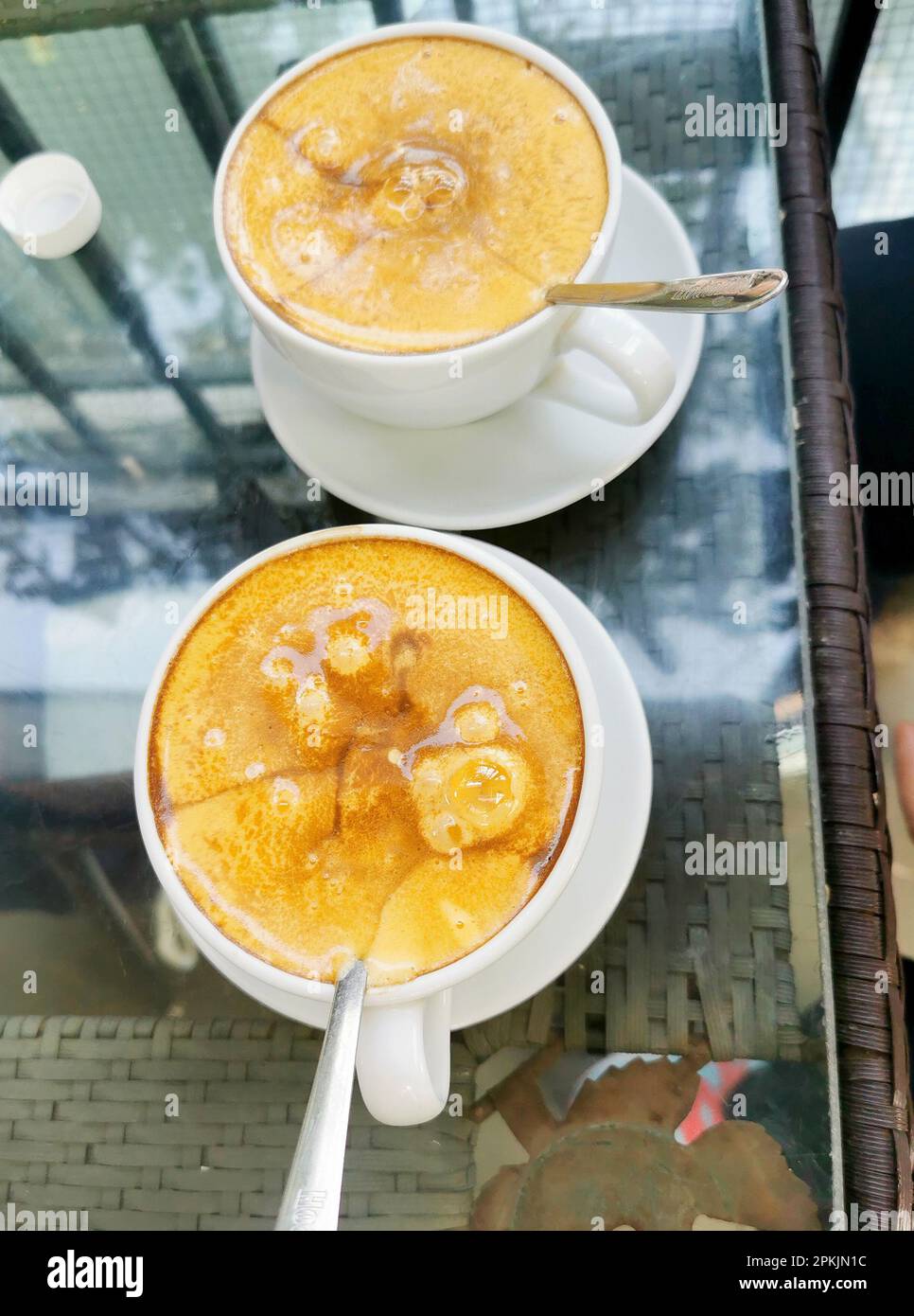 Hanoi, Vietnam. 26th Feb, 2023. Two cups of egg coffee (Egg coffee