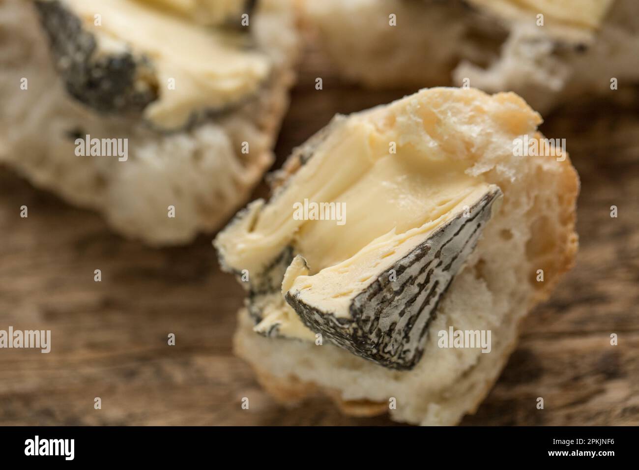 Shepherds Purse Bluemin White cheese on crusty bread. England UK GB Stock Photo