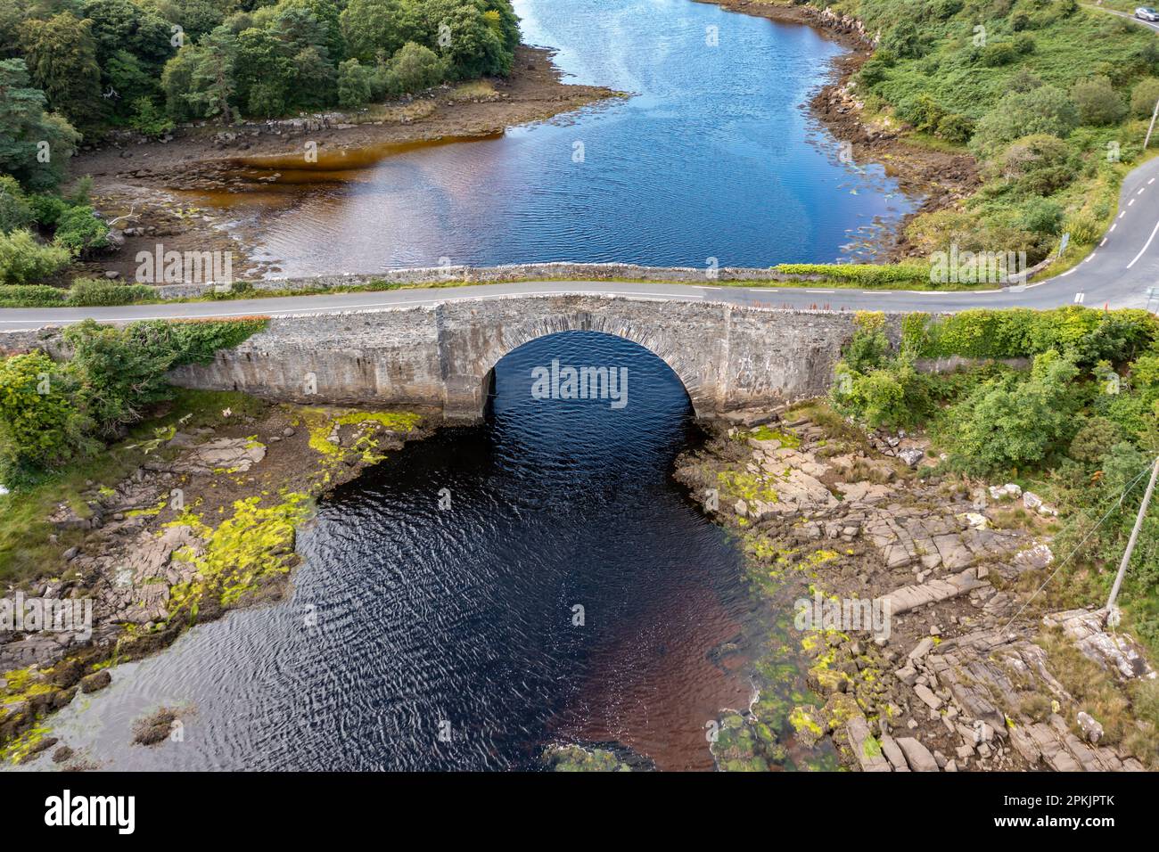Aerial view of the bridge over Lackagh river close to Doe Castle by Creeslough in County Donegal, Republic of Ireland. Stock Photo