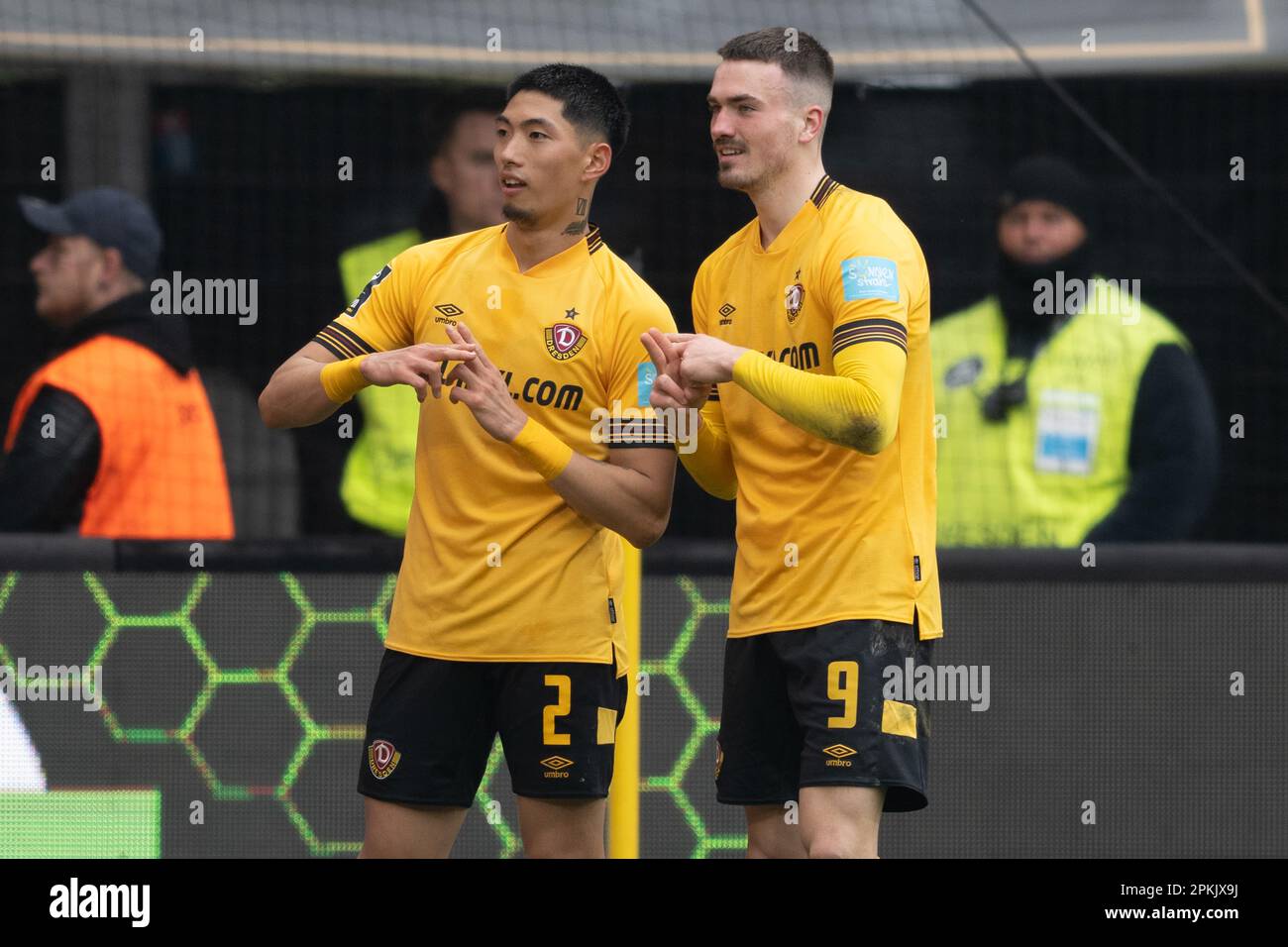 Dresden, Germany. 23rd July, 2022. Soccer: 3rd league, SG Dynamo Dresden - TSV  1860 Munich, Matchday 1, Rudolf-Harbig-Stadion. Dynamo's Tim Knipping  (l-r), Kyu-hyun Park, Dennis Borkowski and Manuel Schäffler cheer. Credit:  Robert