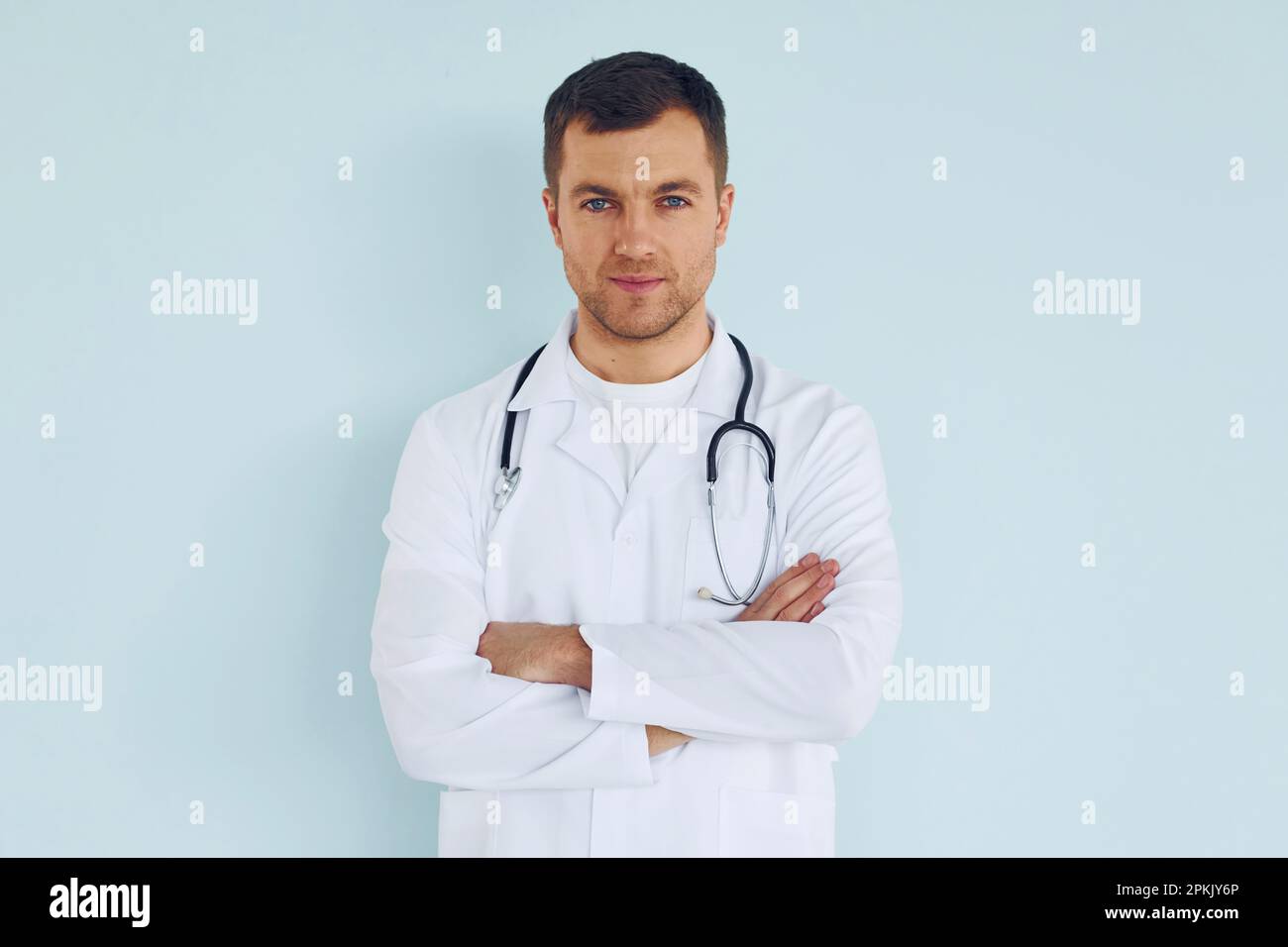 Doctor in uniform standing hi-res stock photography and images - Alamy