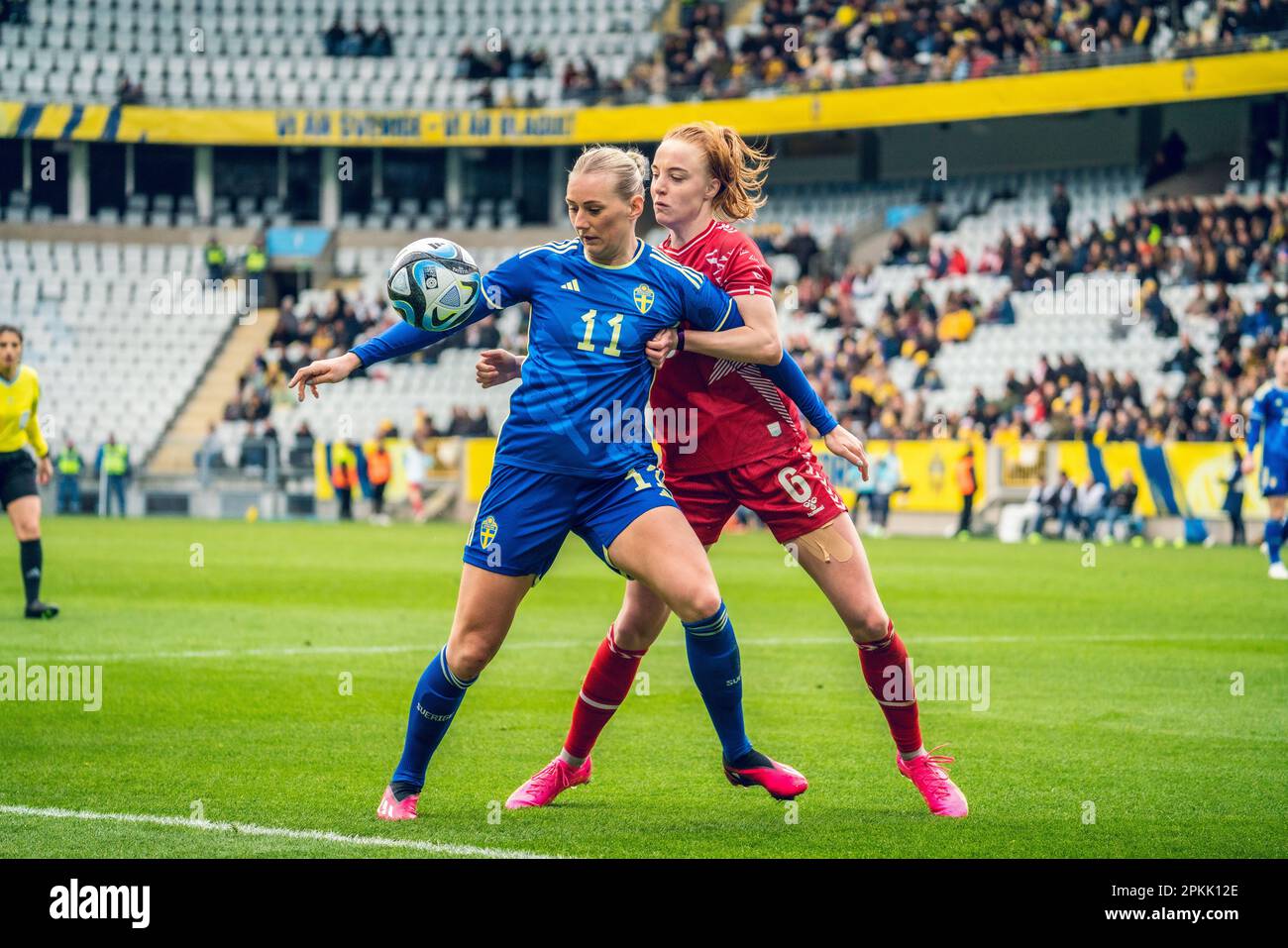 Malmoe, Sweden. 07th Apr, 2023. Stina Blackstenius (11) of Sweden and Karen Holmgaard (6) of Denmark seen during the football friendly between Sweden and Denmark at Eleda Stadion in Malmoe. (Photo Credit: Gonzales Photo/Alamy Live News Stock Photo