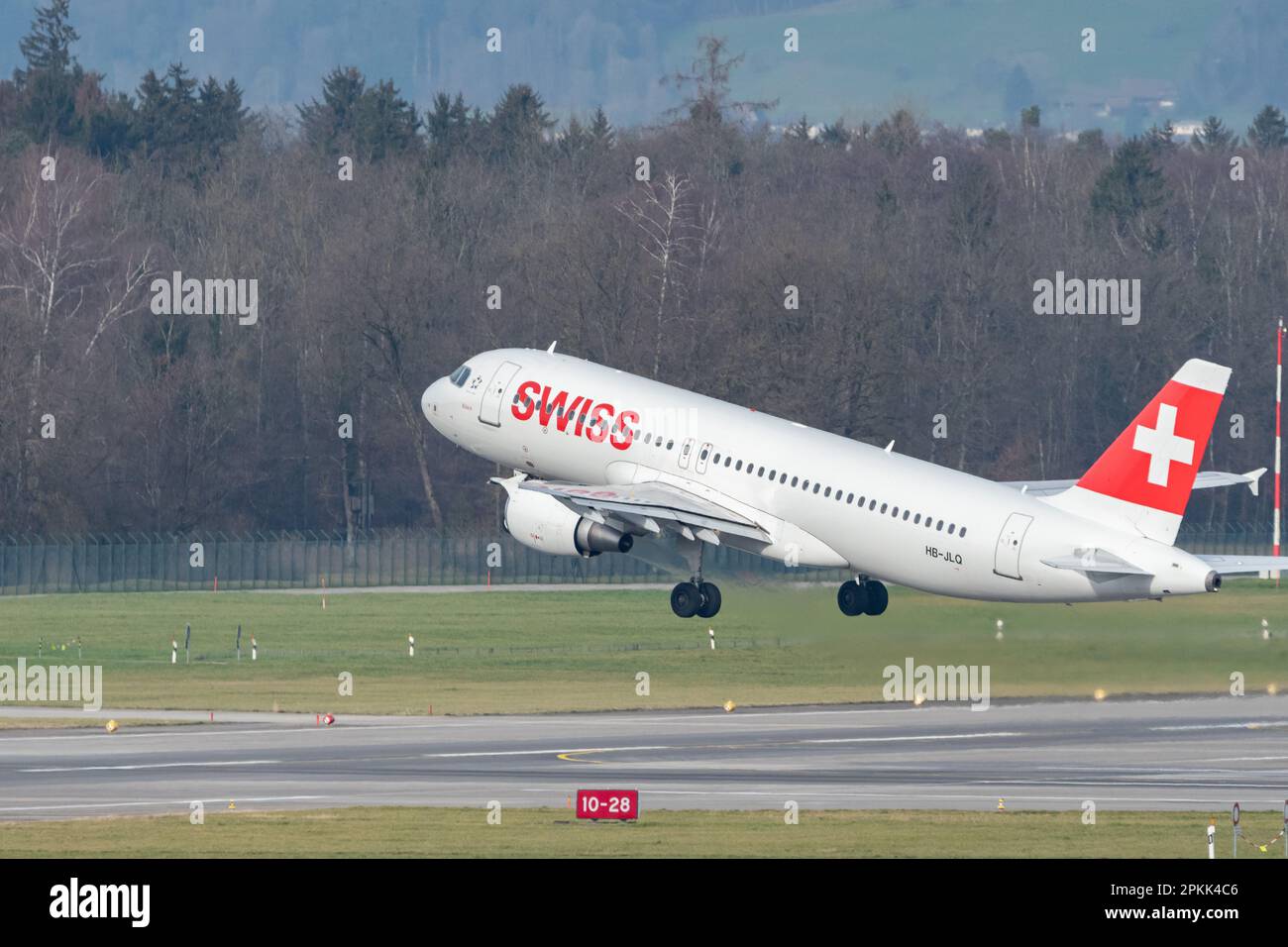 Zurich, Switzerland, January 2, 2023 Swiss international airlines Airbus A320-214 aircraft takeoff from runway 28 Stock Photo