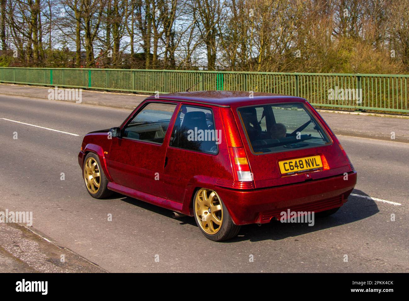 1098 80s eighties RENAULT 5 GT Turbo 1397 cc red petrol hatchback. Modified cars crossing motorway bridge in Greater Manchester, UK Stock Photo
