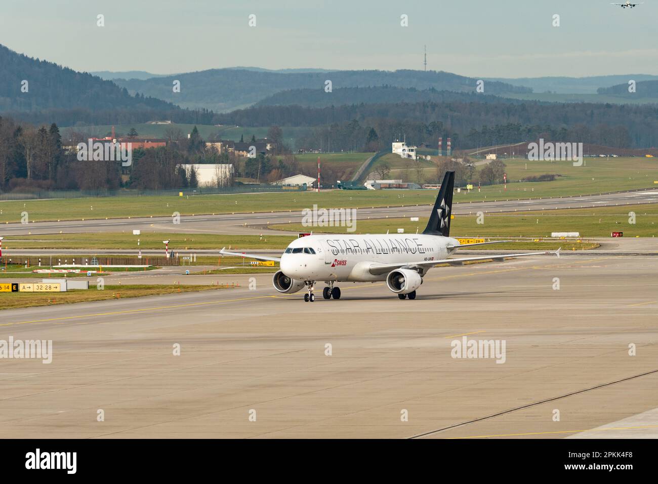 Zurich, Switzerland, January 2, 2023 Swiss international airlines Star Alliance Airbus A320-214 aircraft is taxiing to the gate Stock Photo