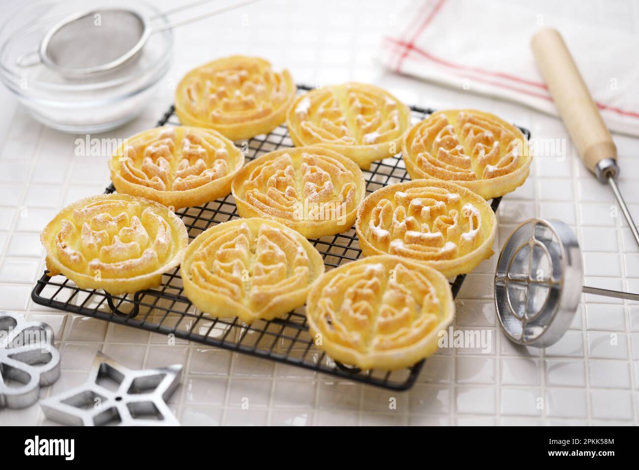 rosette cookies( circle ) on a cake cooling rack Stock Photo