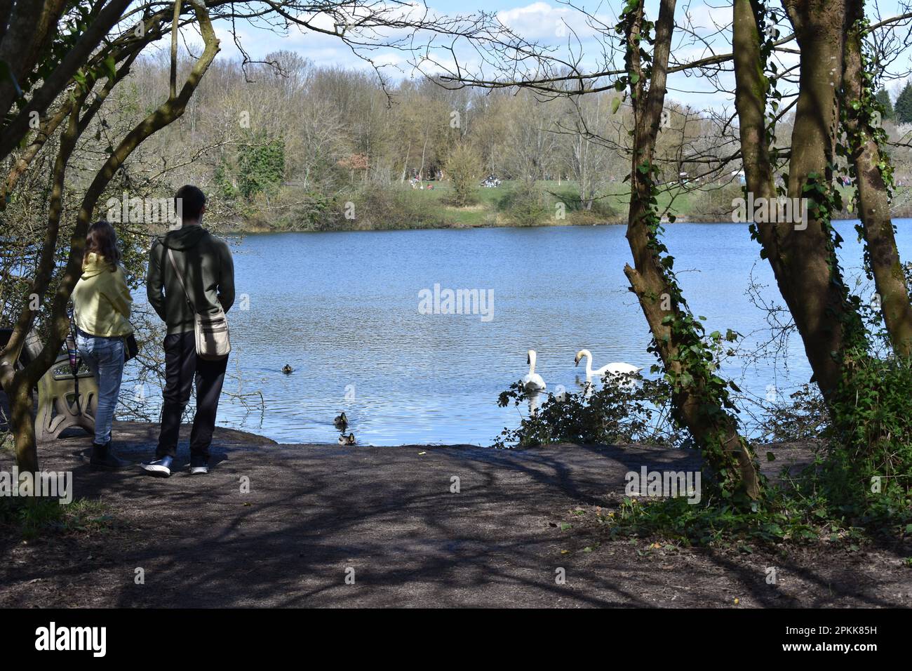 Man and woman enjoying Cosmeston Lakes Country Park Stock Photo
