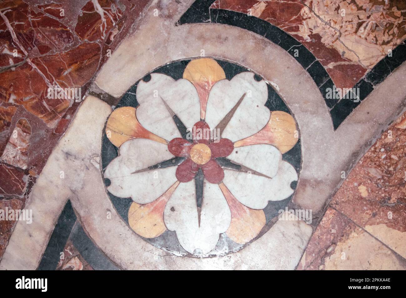 Inlaid marble floor in Santa Teresa degli Scalzi, church in the historic center of Naples, Italy Stock Photo